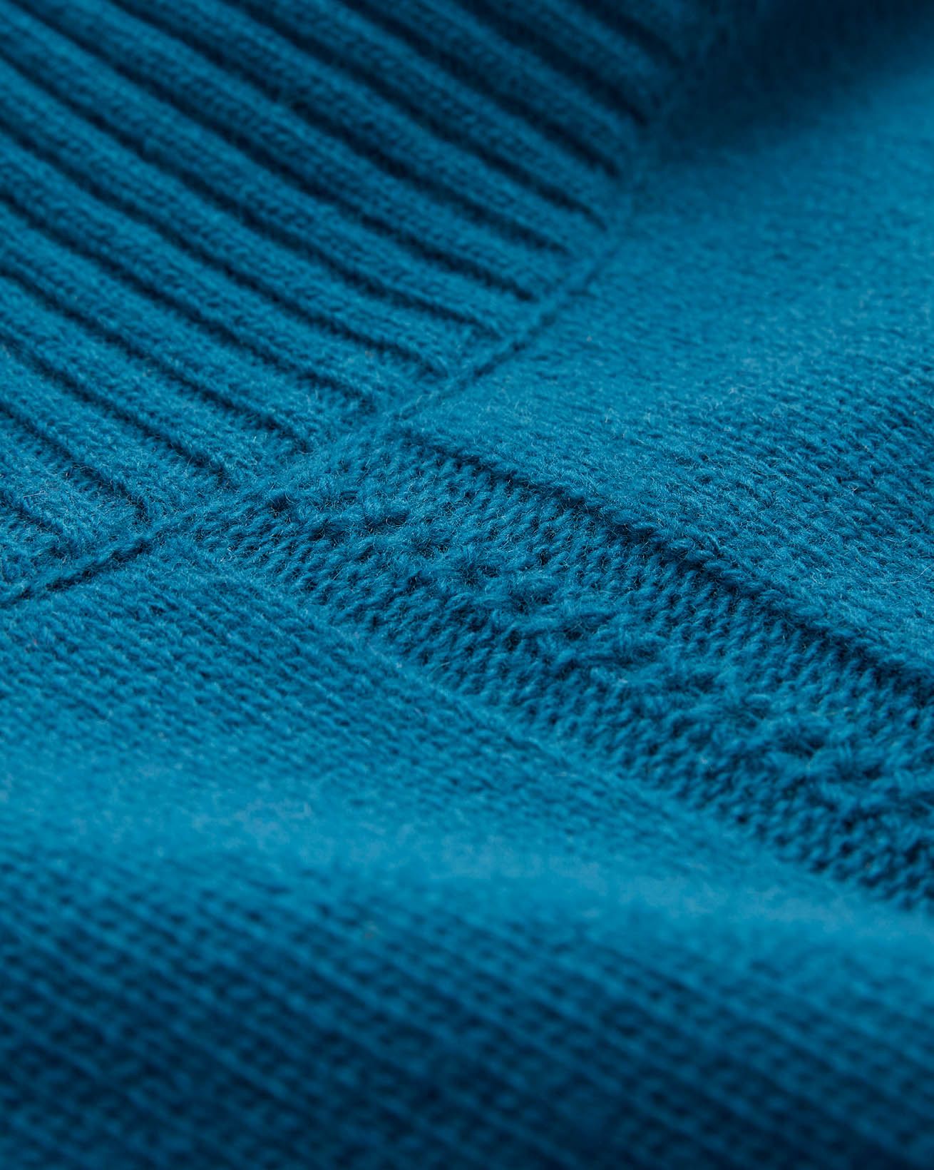 8577_Lambswool-Split-Hem-Roll-Neck-Jumper_Icelandic-Blue_Detail-2_WEB.jpg